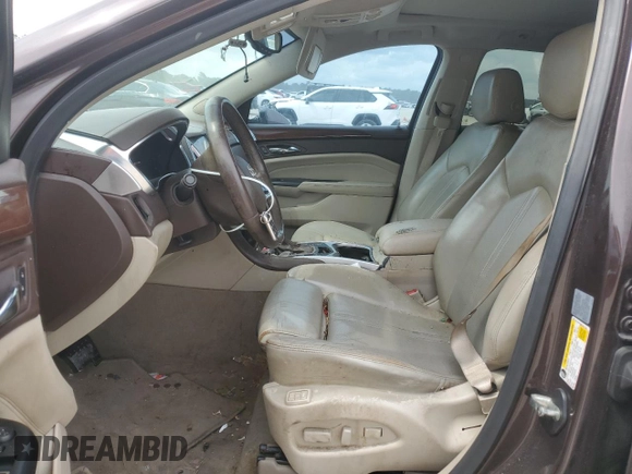 2015 Cadillac SRX Performance Collection with VIN 3GYFNCE38FS571733, listed as a Copart auction lot 54946215 with 147,343 mi miles and Salvage title. Bid and sale history available at DreamBid. Image 7.
