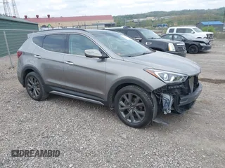 2017 Hyundai Santa Fe Ultimate z VIN 5XYZWDLA4HG441962, wystawiony jako IAAI lot #42144550 z przebiegiem 124 627 mil mil oraz . Historia ofert i sprzedaży dostępna na DreamBid. Obrazek 1.
