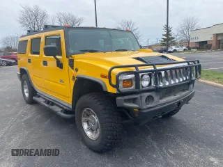 2003 Hummer H2 with VIN 5GRGN23UX3H112710, listed as a Copart auction lot 53854185 with 64,686 mi miles and Salvage Title. Bid and sale history available at carsss.com. Image 1.