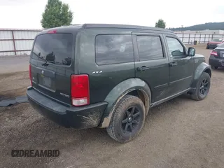 2010 Dodge Nitro SE z VIN 1D4PU2GK4AW125087, wystawiony jako IAAI lot #42554853 z przebiegiem 82 282 mil mil oraz . Historia ofert i sprzedaży dostępna na DreamBid. Obrazek 4.