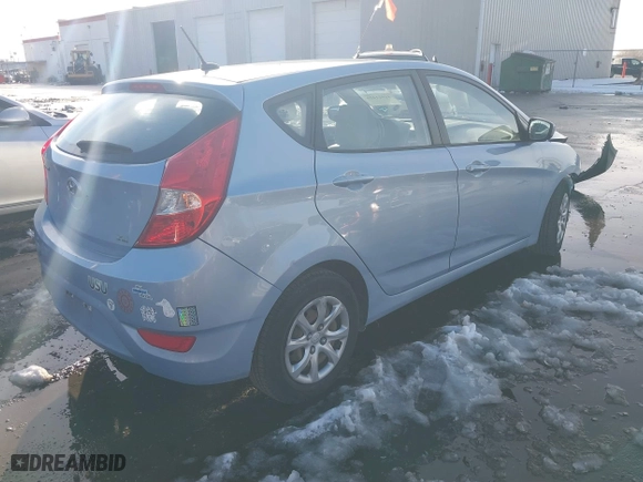 2014 Hyundai Accent GS with VIN KMHCT5AE8EU145312, listed as a IAAI auction lot 41021429 with 70,835 mi miles. Bid and sale history available at carsss.com. Image 4.
