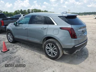 2023 Cadillac XT5 FWD Premium Luxury with VIN 1GYKNCRS3PZ135585, listed as a Copart auction lot 58891914 with 32,325 mi miles and Salvage Title. Bid and sale history available at carsss.com. Image 2.