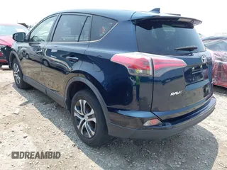 2017 Toyota RAV4 LE with VIN JTMBFREV5HJ173180, listed as a IAAI auction lot 42402753 with 97,917 mi miles and . Bid and sale history available at DreamBid. Image 3.