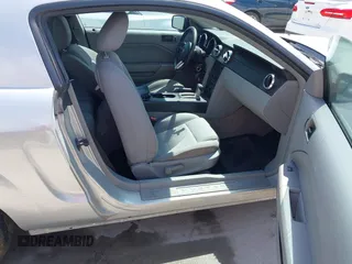 2007 Ford Mustang Deluxe with VIN 1ZVFT80N475296355, listed as a IAAI auction lot 42748184 with 198,104 mi miles and . Bid and sale history available at DreamBid. Image 5.