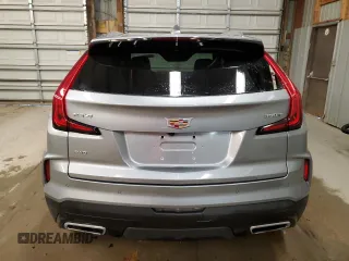 2024 Cadillac XT4 AWD Premium Luxury z VIN 1GYFZDR42RF137782, wystawiony jako Copart lot #79015104 z przebiegiem 11 549 mil mil oraz Czysty tytuł • Clean title. Historia ofert i sprzedaży dostępna na DreamBid. Obrazek 6.