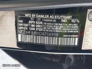 2013 Mercedes-Benz E-Class E 350 Luxury with VIN WDDHF8JBXDA716958, listed as a IAAI auction lot 42080974 with 134,248 mi miles. Bid and sale history available at carsss.com. Image 9.