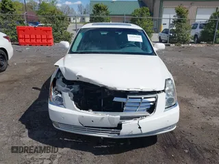 2010 Cadillac DTS 1SC z VIN 1G6KD5EY0AU114294, wystawiony jako IAAI lot #42046408 z przebiegiem 119 142 mil mil oraz . Historia ofert i sprzedaży dostępna na DreamBid. Obrazek 12.