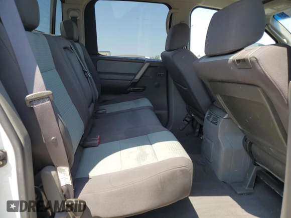 2006 Nissan Titan SE z VIN 1N6AA07A06N535614, wystawiony jako Copart lot #59762005 z przebiegiem 130 296 mil mil oraz Szkoda całkowita • Salvage title. Historia ofert i sprzedaży dostępna na DreamBid. Obrazek 10.