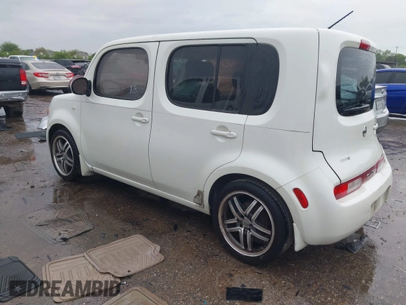 2009 Nissan Cube SL z VIN JN8AZ28R09T107493, wystawiony jako IAAI lot #41895404 z przebiegiem 190 656 mil mil oraz . Historia ofert i sprzedaży dostępna na DreamBid. Obrazek 3.
