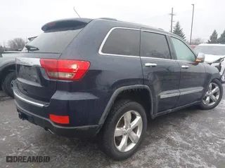2012 Jeep Grand Cherokee Overland with VIN 1C4RJFCT9CC182216, listed as a IAAI auction lot 41490446 with 153,237 mi miles. Bid and sale history available at carsss.com. Image 4.