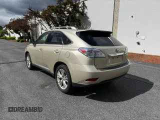 2012 Lexus RX 450h z VIN JTJBC1BA5C2427885, wystawiony jako Copart lot #58626695 z przebiegiem 166 056 mil mil oraz Szkoda całkowita • Salvage title. Historia ofert i sprzedaży dostępna na DreamBid. Obrazek 3.