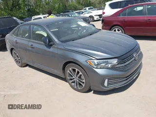 2023 Volkswagen Jetta Sport with VIN 3VWBM7BUXPM058014, listed as a IAAI auction lot 42138928 with 28,491 mi miles and . Bid and sale history available at DreamBid. Image 1.