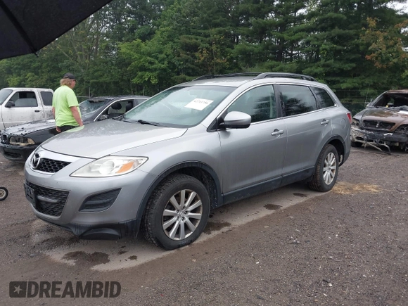 2010 Mazda CX-9 Sport with VIN JM3TB2MA6A0210360, listed as a IAAI auction lot 42711756 with 169,844 mi miles and . Bid and sale history available at DreamBid. Image 2.