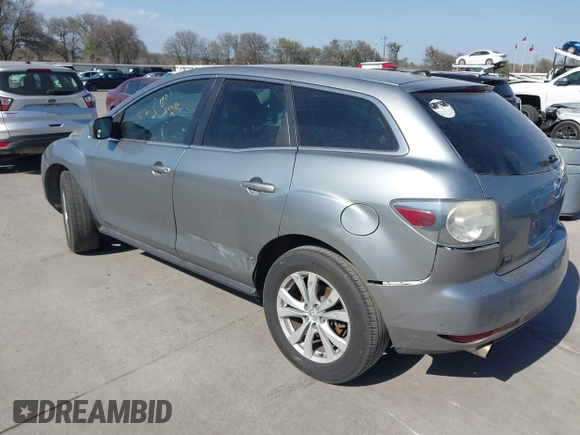 2010 Mazda CX-7 Touring z VIN JM3ER2W30A0319755, wystawiony jako IAAI lot #41786798 z przebiegiem 182 282 mil mil oraz . Historia ofert i sprzedaży dostępna na DreamBid. Obrazek 3.