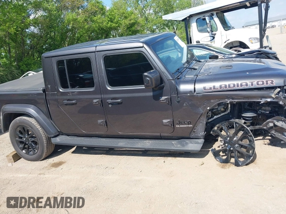 2021 Jeep Gladiator High Altitude z VIN 1C6HJTFG1ML597581, wystawiony jako IAAI lot #42191690 z przebiegiem 47 740 mil mil oraz . Historia ofert i sprzedaży dostępna na DreamBid. Obrazek 13.