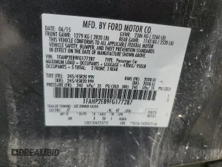 2015 Ford Taurus SEL z VIN 1FAHP2E89FG177287, wystawiony jako Copart lot #56074615 z przebiegiem 196 421 mil mil oraz Szkoda całkowita • Salvage title. Historia ofert i sprzedaży dostępna na DreamBid. Obrazek 13.
