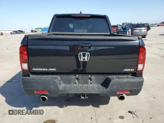 2023 Honda Ridgeline RTL-E with VIN 5FPYK3F72PB001592, listed as a Copart auction lot 52154625 with 41,153 mi miles and Salvage title. Bid and sale history available at DreamBid. Image 6.