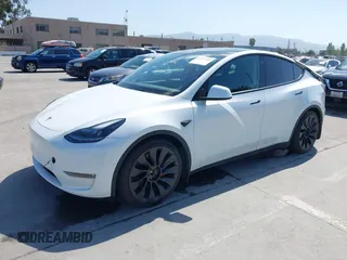 2022 Tesla Model Y Performance z VIN 7SAYGDEF2NF347456, wystawiony jako IAAI lot #42177725 z przebiegiem 29 374 mil mil oraz . Historia ofert i sprzedaży dostępna na DreamBid. Obrazek 2.