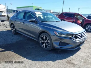 2021 Volkswagen Passat SE z VIN 1VWSA7A32MC003426, wystawiony jako IAAI lot #41897491 z przebiegiem 18 489 mil mil oraz . Historia ofert i sprzedaży dostępna na DreamBid. Obrazek 1.