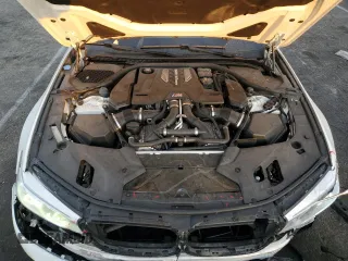 2019 BMW M5 z VIN WBSJF0C53KB284878, wystawiony jako Copart lot #86763564 z przebiegiem Nie podano mil oraz Szkoda całkowita • Salvage title. Historia ofert i sprzedaży dostępna na DreamBid. Obrazek 11.