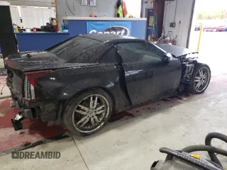 2005 Cadillac XLR z VIN 1G6YV34AX55601101, wystawiony jako Copart lot #75821644 z przebiegiem Nie podano mil oraz Szkody całkowita. Historia ofert i sprzedaży dostępna na DreamBid. Obrazek 3.