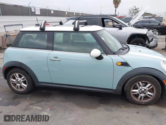 2013 MINI Hardtop with VIN WMWSU3C50DT546031, listed as a IAAI auction lot 42542290 with 119,711 mi miles and . Bid and sale history available at DreamBid. Image 13.