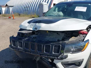 2021 Jeep Compass Trailhawk with VIN 3C4NJDDB0MT551172, listed as a IAAI auction lot 40155947 with 50,794 mi miles and . Bid and sale history available at DreamBid. Image 6.