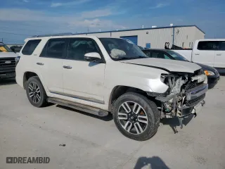 2014 Toyota 4Runner SR5 with VIN JTEZU5JR2E5073298, listed as a Copart auction lot 50777525 with 172,689 mi miles and Salvage Title. Bid and sale history available at carsss.com. Image 4.