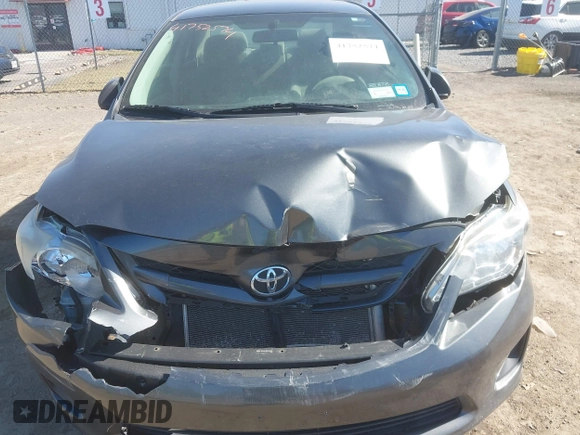2011 Toyota Corolla L with VIN 2T1BU4EEXBC754279, listed as a IAAI auction lot 41752574 with 187,619 mi miles. Bid and sale history available at carsss.com. Image 6.