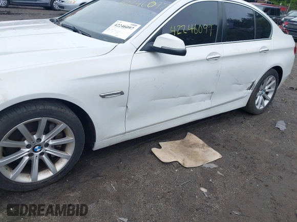 2014 BMW 5 Series 535i xDrive with VIN WBA5B3C57ED538801, listed as a IAAI auction lot 42246097 with 170,219 mi miles and . Bid and sale history available at DreamBid. Image 6.