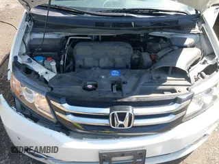 2014 Honda Odyssey Touring with VIN 5FNRL5H94EB071788, listed as a IAAI auction lot 42523959 with 244,734 mi miles and . Bid and sale history available at DreamBid. Image 10.