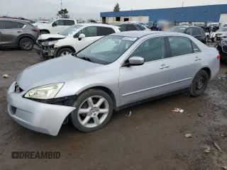 2003 Honda Accord LX z VIN 1HGCM55303A083589, wystawiony jako Copart lot #86232144 z przebiegiem Nie podano mil oraz Czysty tytuł • Clean title. Historia ofert i sprzedaży dostępna na DreamBid. Obrazek 1.