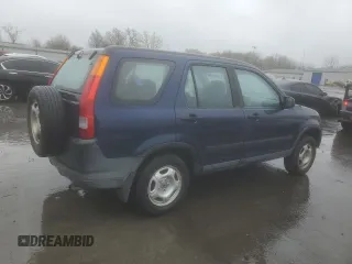 2004 Honda CR-V LX with VIN SHSRD78474U252663, listed as a Copart auction lot 52090185 with 202,703 mi miles and Salvage Title. Bid and sale history available at carsss.com. Image 3.