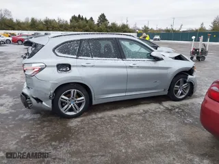 2016 BMW X1 xDrive28i with VIN WBXHT3C3XG5E51358, listed as a IAAI auction lot 41730597 with 90,010 mi miles. Bid and sale history available at carsss.com. Image 13.