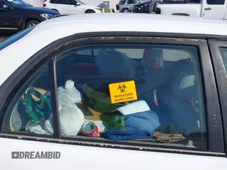 2002 Toyota Corolla CE with VIN 2T1BR12EX2C523872, listed as a IAAI auction lot 41831610 with Not provided miles and . Bid and sale history available at DreamBid. Image 8.