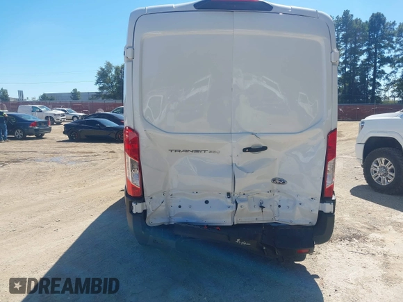 2022 Ford Transit Cargo with VIN 1FTBR1C84NKA76483, listed as a IAAI auction lot 40365786 with 28,854 mi miles and . Bid and sale history available at DreamBid. Image 6.