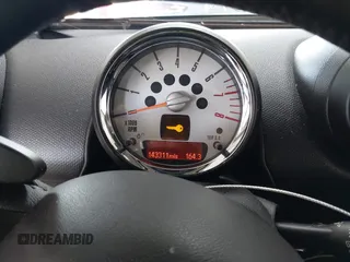 2013 MINI Countryman S with VIN WMWZC3C56DWP24170, listed as a IAAI auction lot 42366594 with 143,311 mi miles and . Bid and sale history available at DreamBid. Image 7.