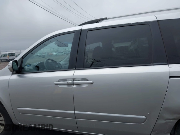 2012 Kia Sedona LX with VIN KNDMG4C72C6485952, listed as a IAAI auction lot 42029147 with 129,296 mi miles. Bid and sale history available at carsss.com. Image 14.