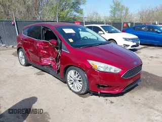 2015 Ford Focus Titanium with VIN 1FADP3N24FL380210, listed as a IAAI auction lot 41990748 with 102,613 mi miles and . Bid and sale history available at DreamBid. Image 1.