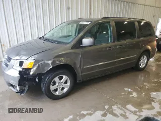 2010 Dodge Grand Caravan SXT with VIN 2D4RN5D1XAR268587, listed as a Copart auction lot 55072485 with 322,312 mi miles and Non Repairable. Bid and sale history available at DreamBid. Image 1.