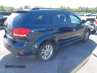 2014 Dodge Journey SXT z VIN 3C4PDDBG8ET193254, wystawiony jako IAAI lot #42146303 z przebiegiem 270 000 mil mil oraz . Historia ofert i sprzedaży dostępna na DreamBid. Obrazek 4.