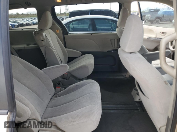 2012 Toyota Sienna LE AAS с VIN 5TDKK3DC6CS276676, выставлен на аукционе Copart как лот 56898135 с пробегом 167 432 миль миль и Списание • Salvage title. История ставок и продаж доступна на DreamBid. Изображение 11.