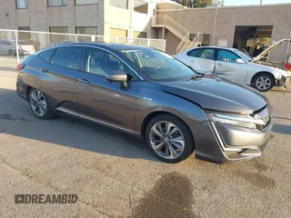 2019 Honda Clarity Plug-In Hybrid with VIN JHMZC5F15KC006386, listed as a IAAI auction lot 41239886 with 80,247 mi miles. Bid and sale history available at carsss.com. Image 1.