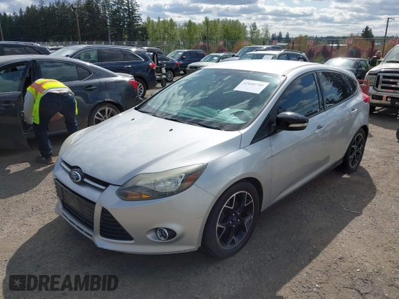2013 Ford Focus SE with VIN 1FADP3K25DL335939, listed as a IAAI auction lot 42088780 with 149,957 mi miles. Bid and sale history available at carsss.com. Image 2.