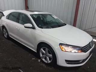 2013 Volkswagen Passat SE w/Sunroof with VIN 1VWBH7A35DC111003, listed as a IAAI auction lot 41991990 with 142,103 mi miles. Bid and sale history available at carsss.com. Image 1.