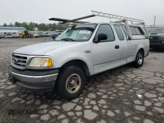 2003 Ford F-150 XL z VIN 1FTRX17213NA86474, wystawiony jako Copart lot #55218995 z przebiegiem 255 832 mil mil oraz Szkoda całkowita • Salvage title. Historia ofert i sprzedaży dostępna na DreamBid. Obrazek 1.
