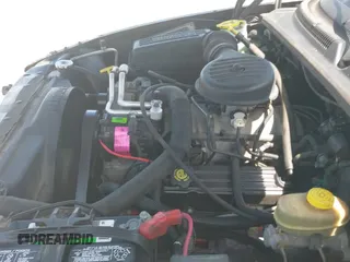 1998 Dodge Dakota SLT z VIN 1B7GL22Y1WS502985, wystawiony jako IAAI lot #42600748 z przebiegiem Nie podano mil oraz . Historia ofert i sprzedaży dostępna na DreamBid. Obrazek 13.