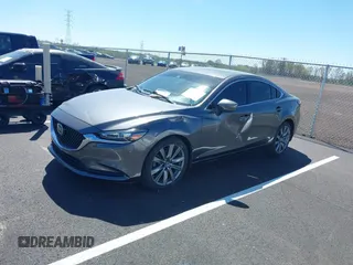 2020 Mazda 6 Grand Touring with VIN JM1GL1TY0L1522025, listed as a IAAI auction lot 41876429 with 68,101 mi miles and . Bid and sale history available at DreamBid. Image 17.