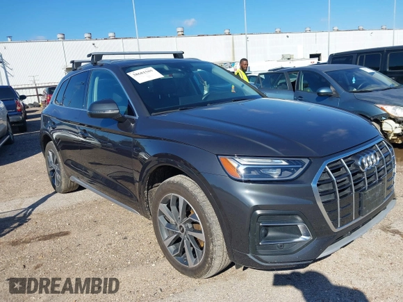 2021 Audi Q5 Premium Plus z VIN WA1BAAFY6M2013249, wystawiony jako IAAI lot #38681569 z przebiegiem 68 694 mil mil oraz . Historia ofert i sprzedaży dostępna na DreamBid. Obrazek 1.