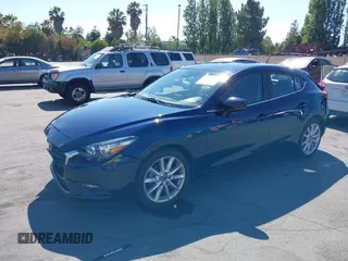 2017 Mazda 3 Touring with VIN 3MZBN1L77HM140562, listed as a IAAI auction lot 42761296 with 76,987 mi miles and . Bid and sale history available at DreamBid. Image 2.